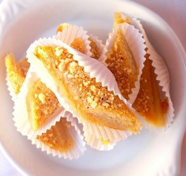 Naranjas con almendras en almíbar