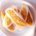 Naranjas con almendras en almíbar